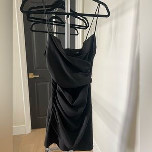 Black mini dress with cut out.